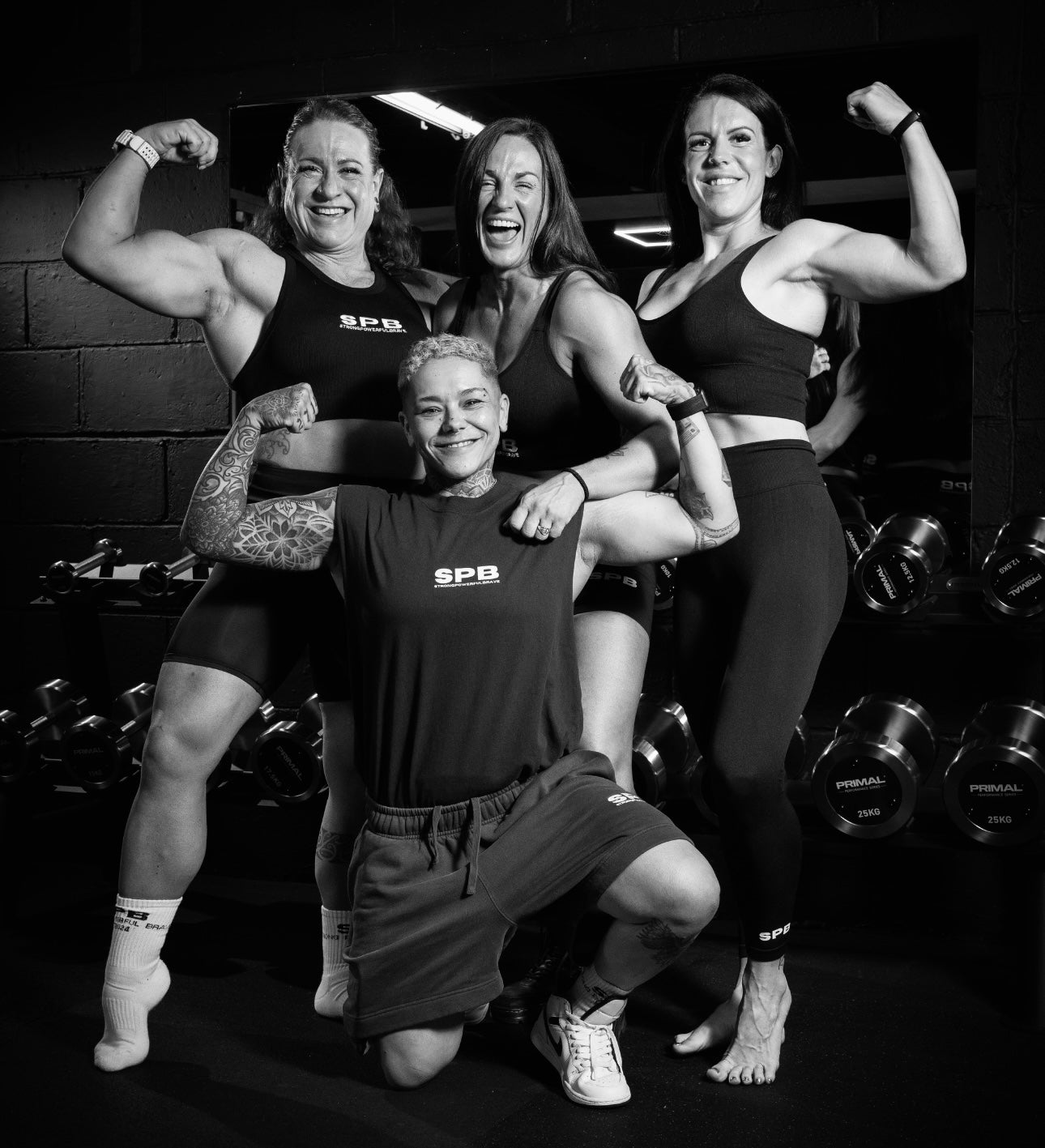 The founder in the middle with her three strongest powerful friends 