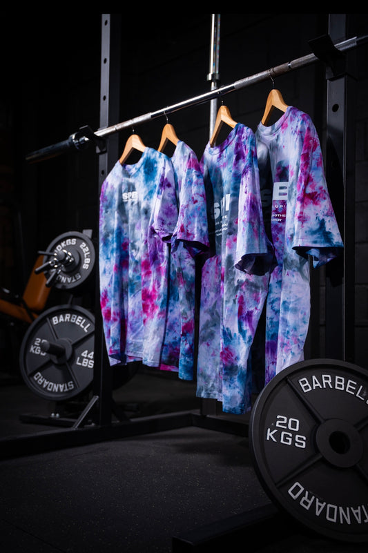 SPB oversize purple rain thsirt being shown in a photo studio 